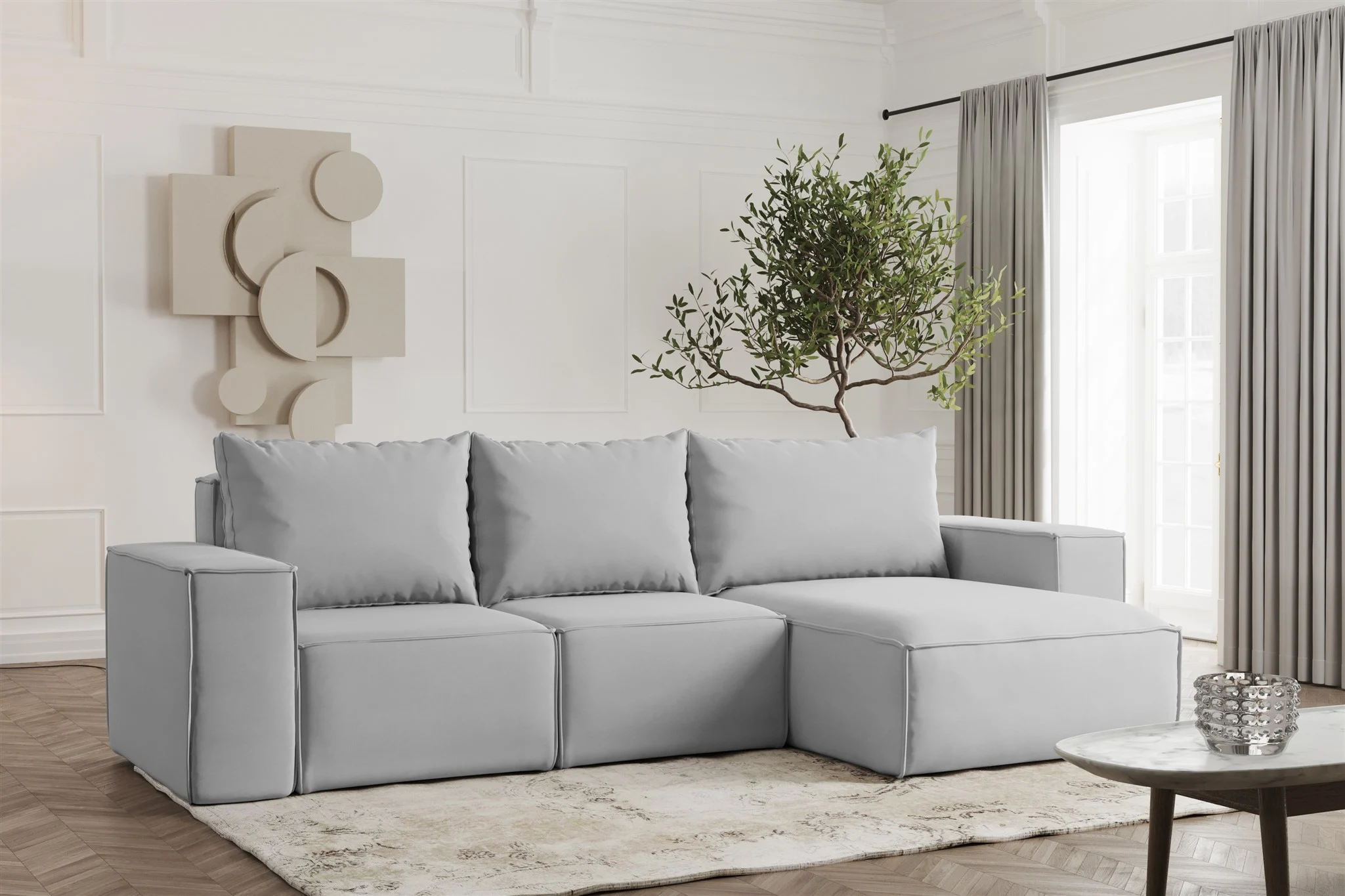 Ecksofa Designersofa ESTELLE in Stoff Opera Velvet Hellgrau Ottomane Rechts - Fun Möbel
